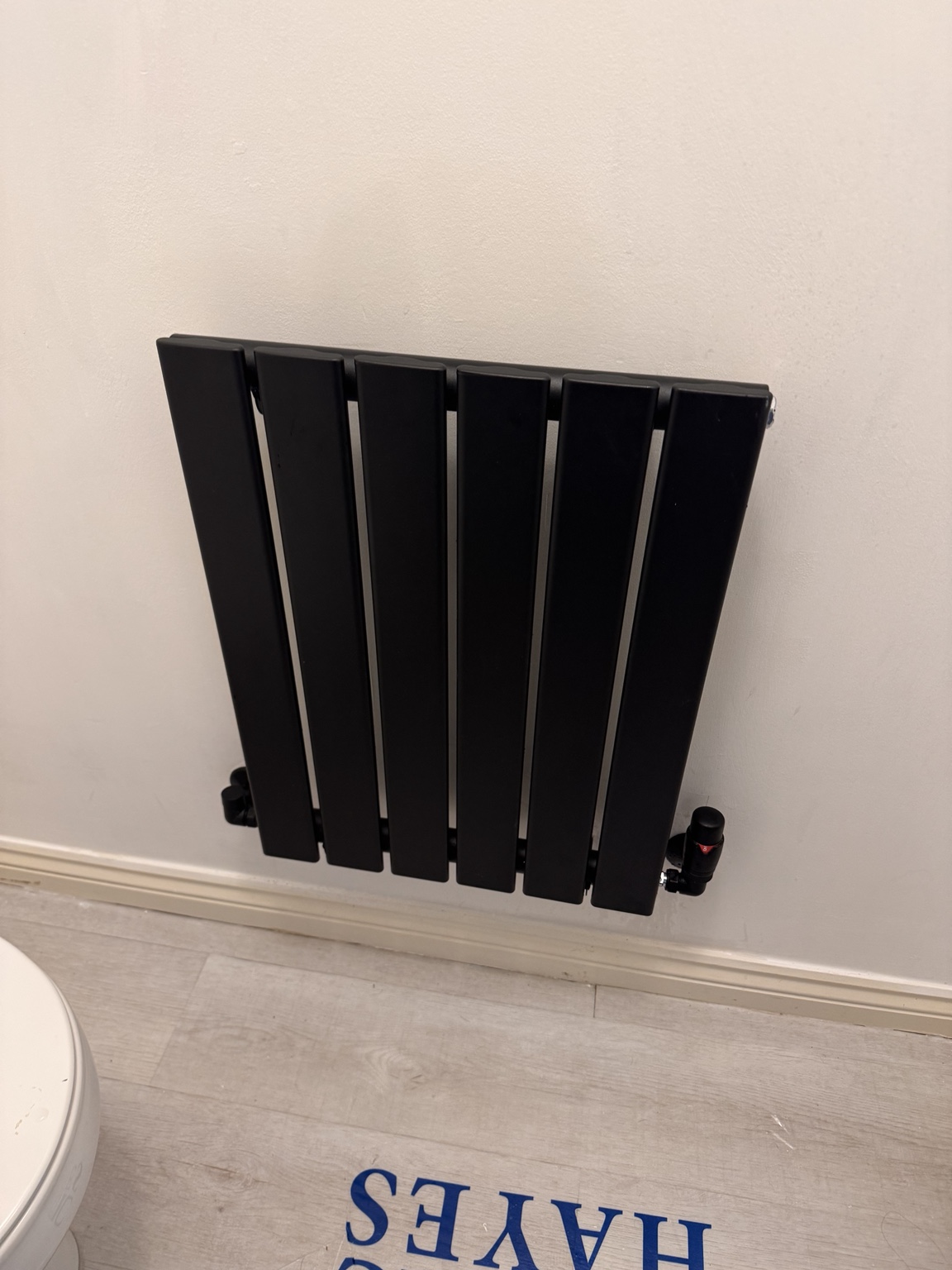 Compact black radiator installed by SMC