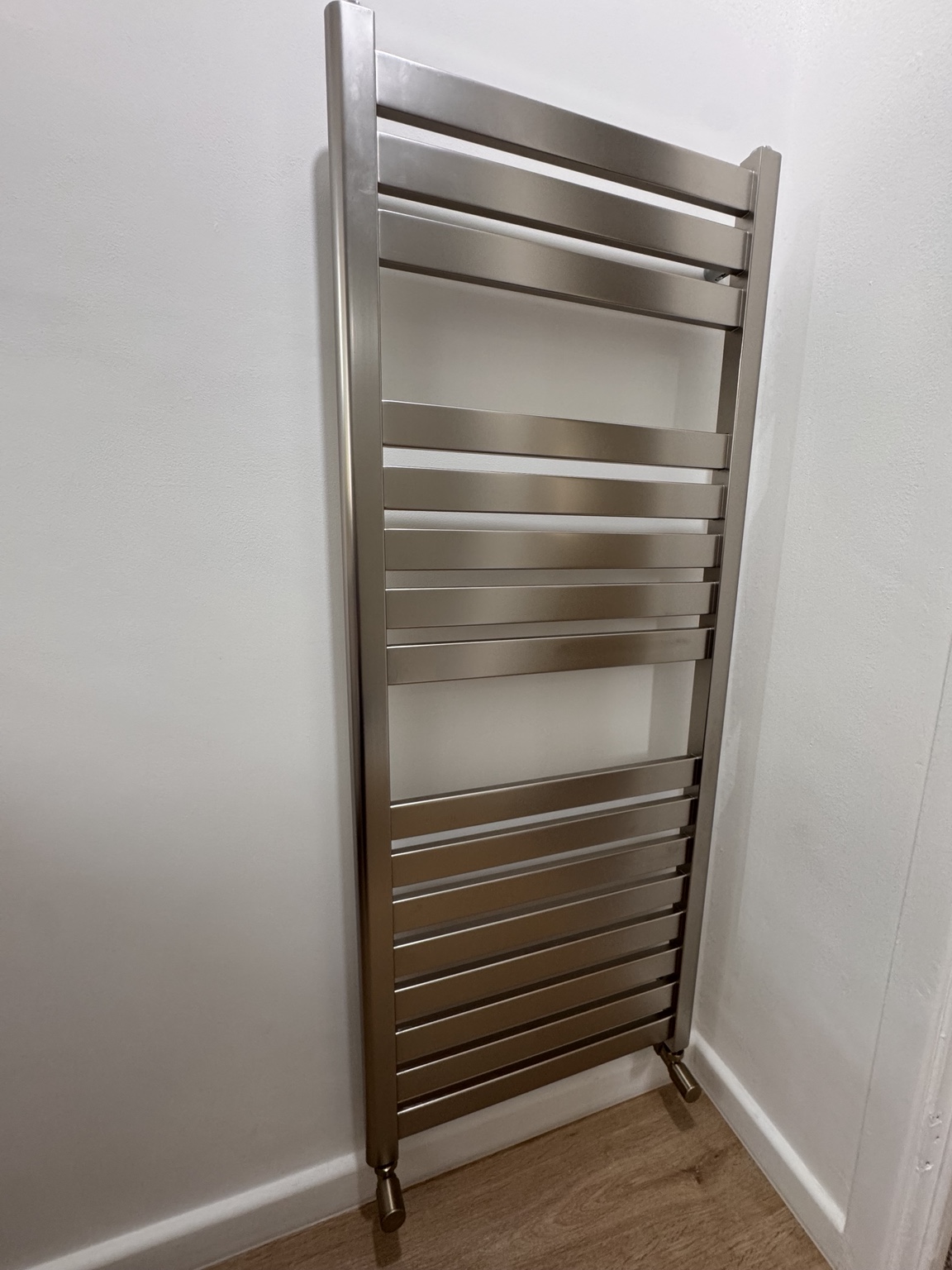 Silver-finish towel rail installed by SMC